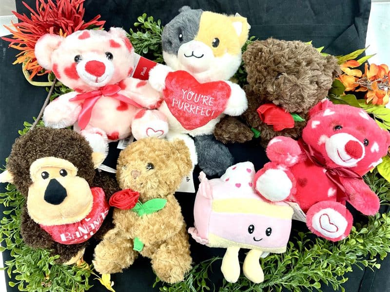 An assortment of plush toys offered as gift add-ons.